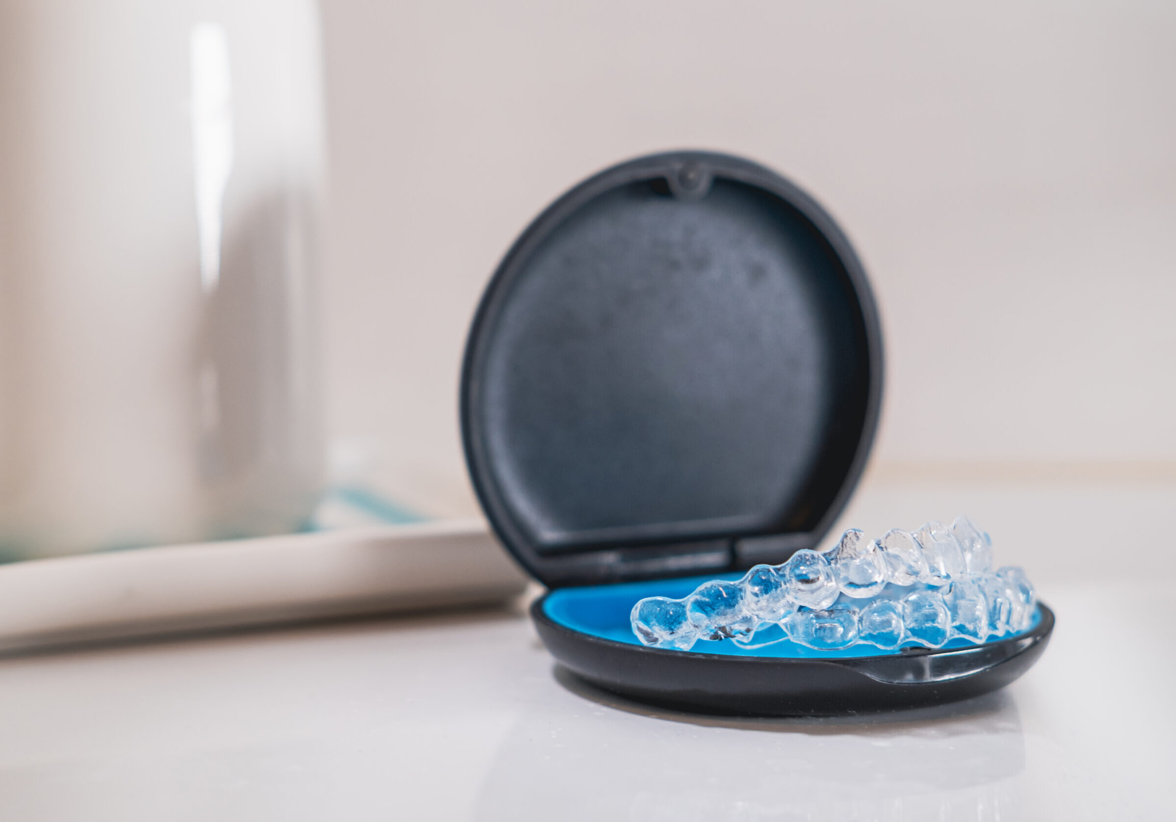 Transparent teeth aligners in a box.